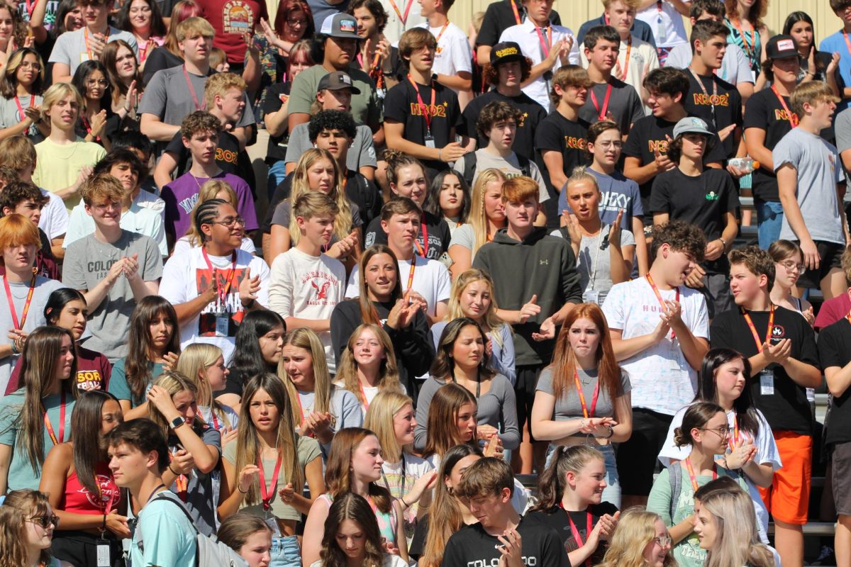 Students+wear+their+lanyards+at+the+pep+rally+on+Sept.+1.+Students+received+lanyards+during+school+on+Aug.+23+and+24.