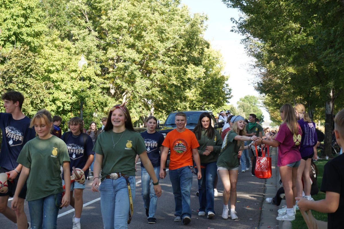 Windsor FFA walks together during the homecoming parade. FFA members had a float theme of “Western Goes Hollywood.”
