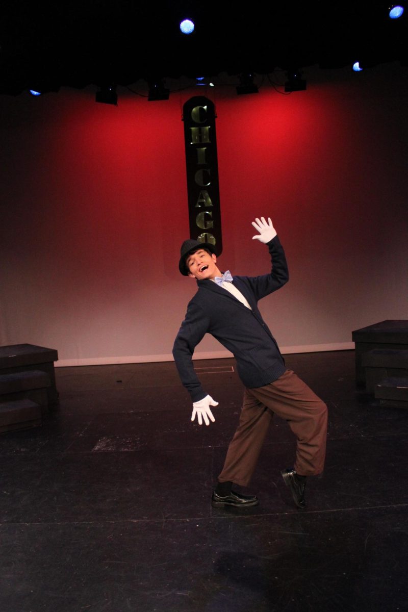 Owen Burnett is seen posing as his character, Amus, in last years musical performance: Chicago. Owen has been apart of several theatrical productions along with swimming, and knowledge bowl. 