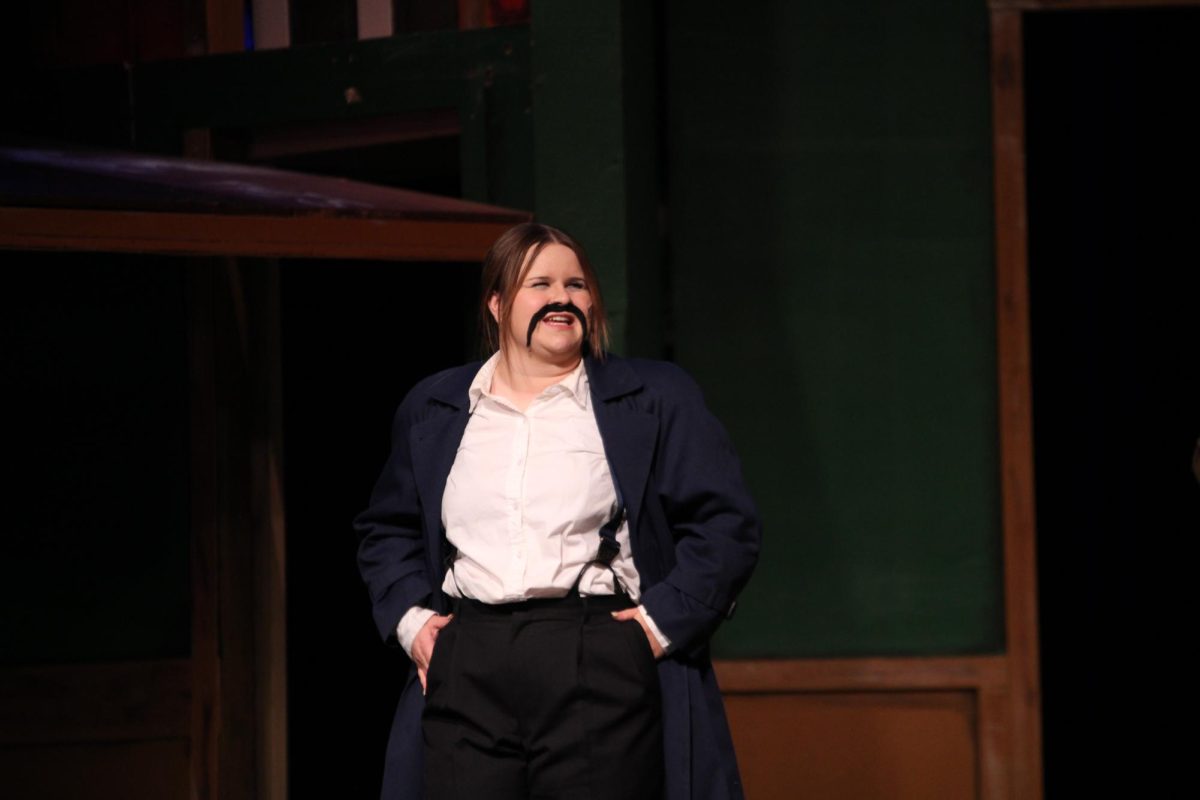Gabby Overholt(12) is seen playing Detective Carter in this years school production of The Play that Goes Wrong. Gabby was also involved in marching band and the pit for the musical.