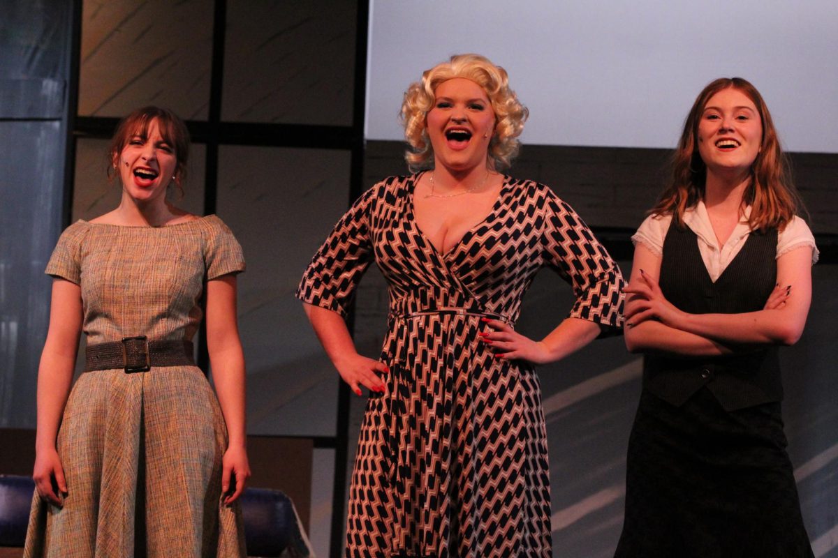 Opal Schlessman (12), Libby Lightfoot (12) and Sage Anderson (12) sing Shine Like the Sun during the Act 1 finale of 9 to 5. The shows music and lyrics were written by Dolly Parton.