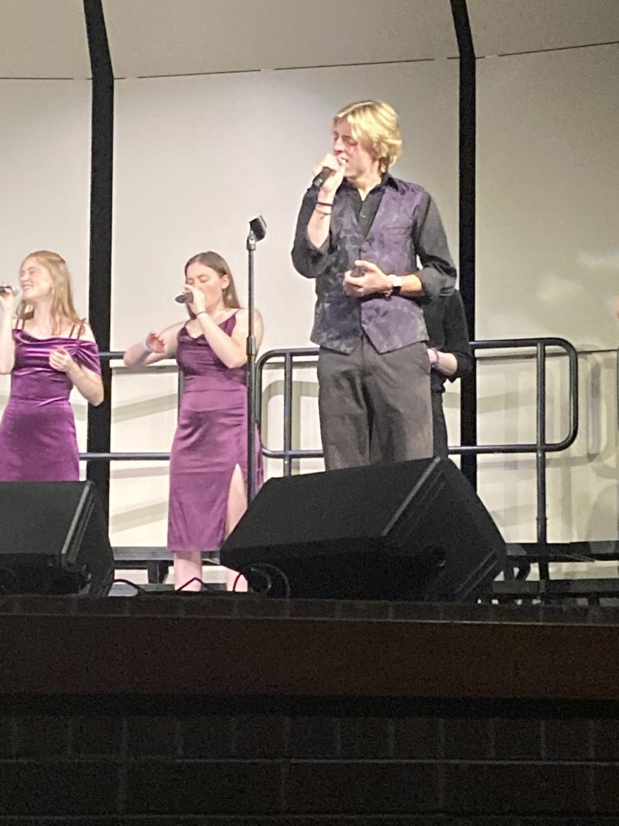 Nelson Welton (11) sings his solo during the opening of Black Hole Sun. 