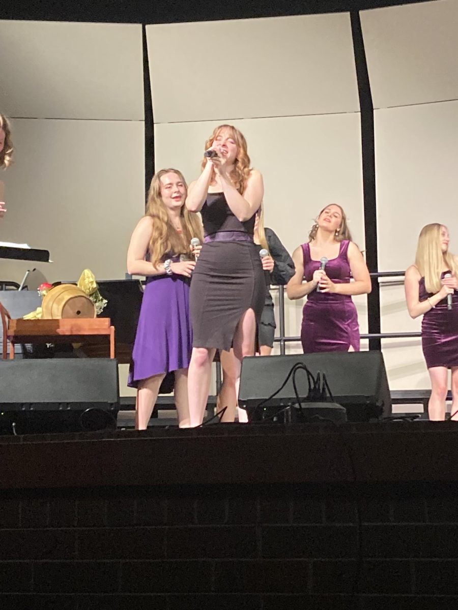 Opal Schlessman (12) sings the opening solo to Dont Lose Sight. 