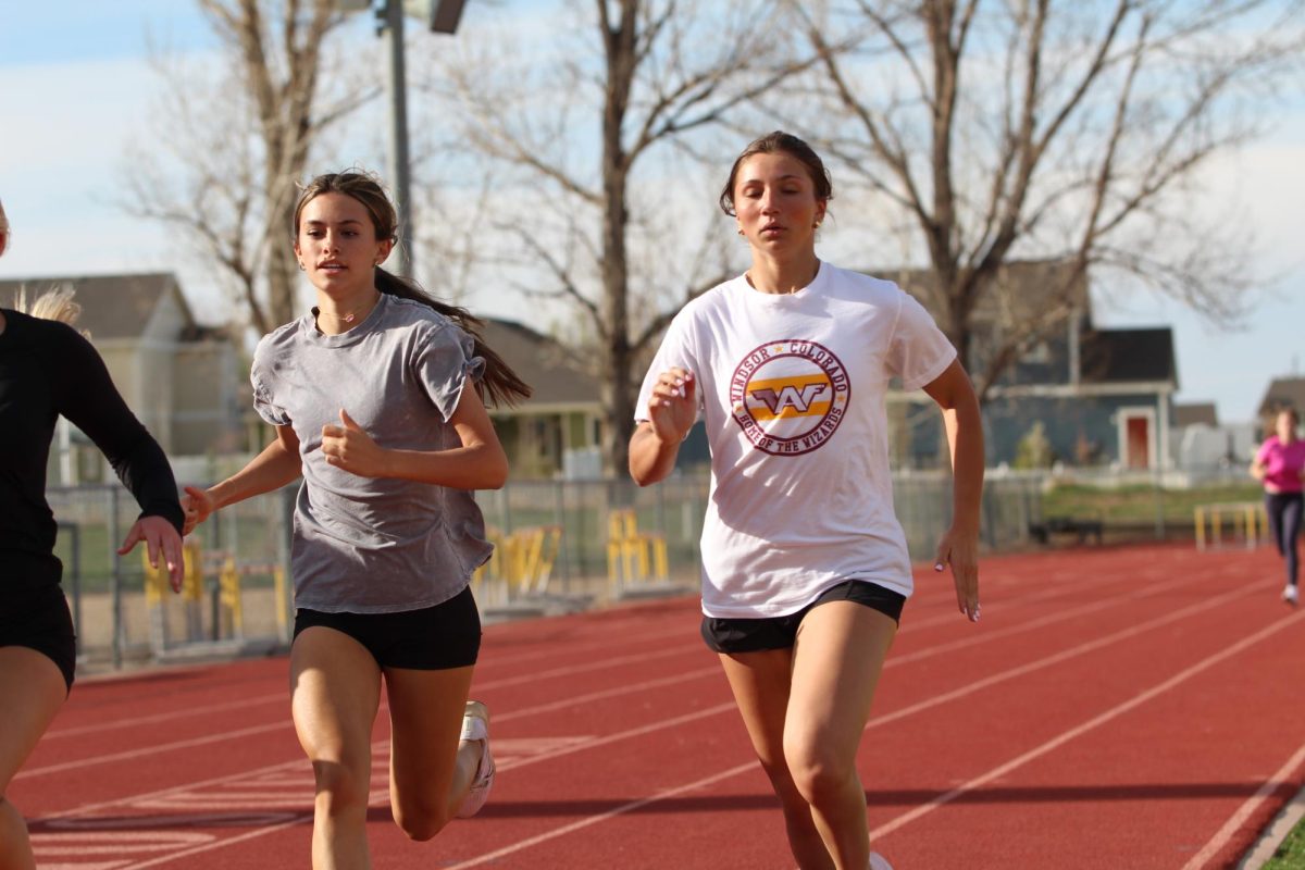 Lindsey Hinson (11) runs the workout with the rest of the track team. She suffered a hamstring injury in the middle of her season, so she took each exercise slowly. 