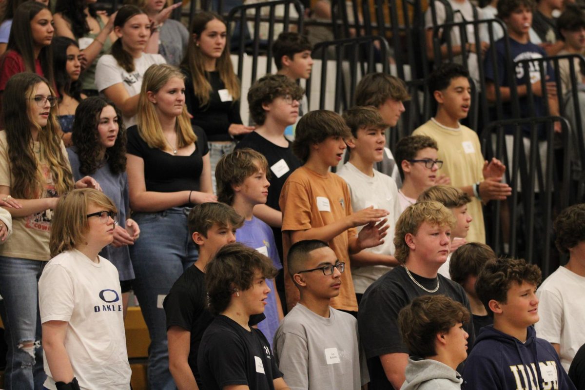 Freshmen watch the activities that Link Crew prepared for them during freshman invasion on Aug. 14. As the incoming freshmen adjust to high school, they've seen highs and lows so far.