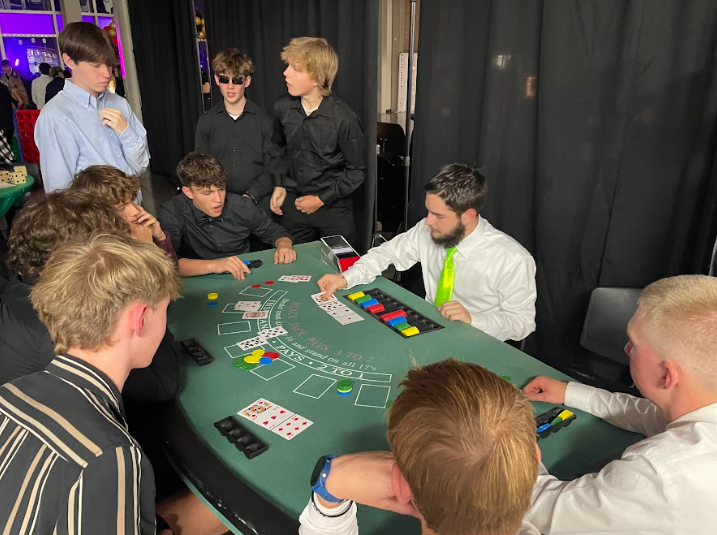 Students play poker during homecoming