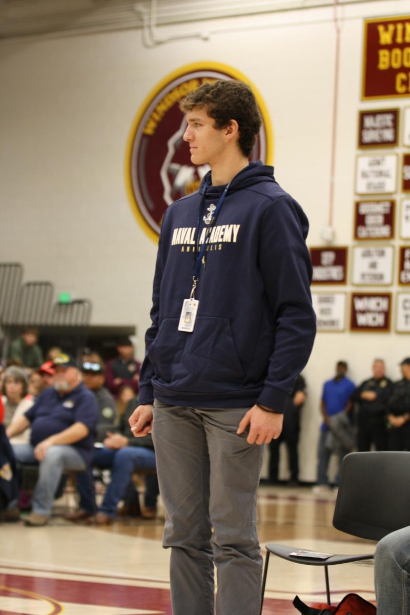 Tristyn Bruning (12) stands up to be recognized as his name was called. Bruning is planning to start in the Naval Academy after graduation. “My dad was supposed to go to the Naval Academy when he was in high school, and he was going to go for football. However, he shattered his knee at the game the recruiters were at, which took his football scholarship away ... Then, when I was in middle school, it started to become a goal of mine to go to the Naval Academy. Then freshman or sophomore year, I learned what it meant to go into the Naval Academy and how much work, energy, dedication and effort it took."