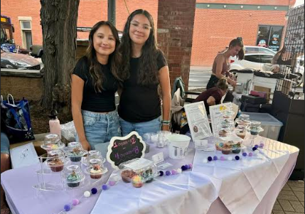 Aneesia DelaGarza (12) sells cupcakes at the Valentine Flea market in Loveland with her sister. This was to promote her business Nene's Confections.