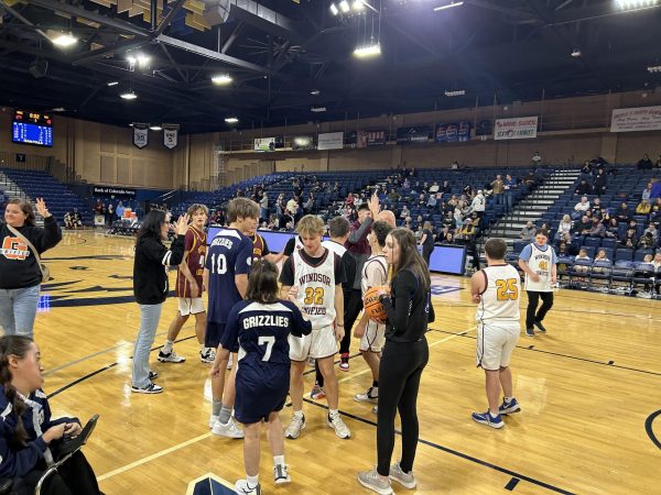 basketball players high five after a game