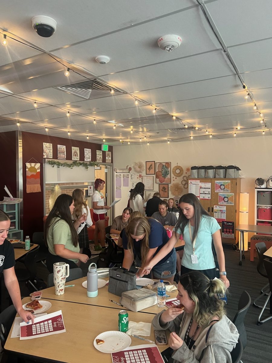 FCCLA members work on miscellaneous projects in Jessica Teal's (staff) room during lunch. This was their first meeting of the year.