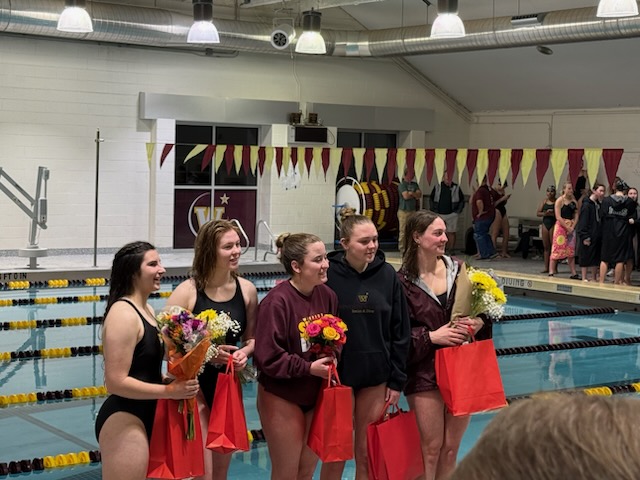 (From left to right) Julie Abbott (12), Ella Sekerak (12), Kylie Farris (12), Kayla Knifong (12) and Sienna Hawbaker (12) pose for pictures after being introduced. Each senior was honored with gift bags and verbal recognition. (Photo provided by Dennis Bruns)