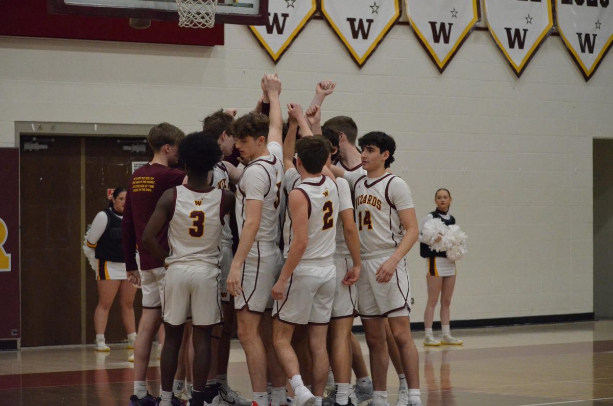 The team gets ready for the game agianst Centaurus on Jan. 11. The team won the game 57-33 and is currently first in their division.