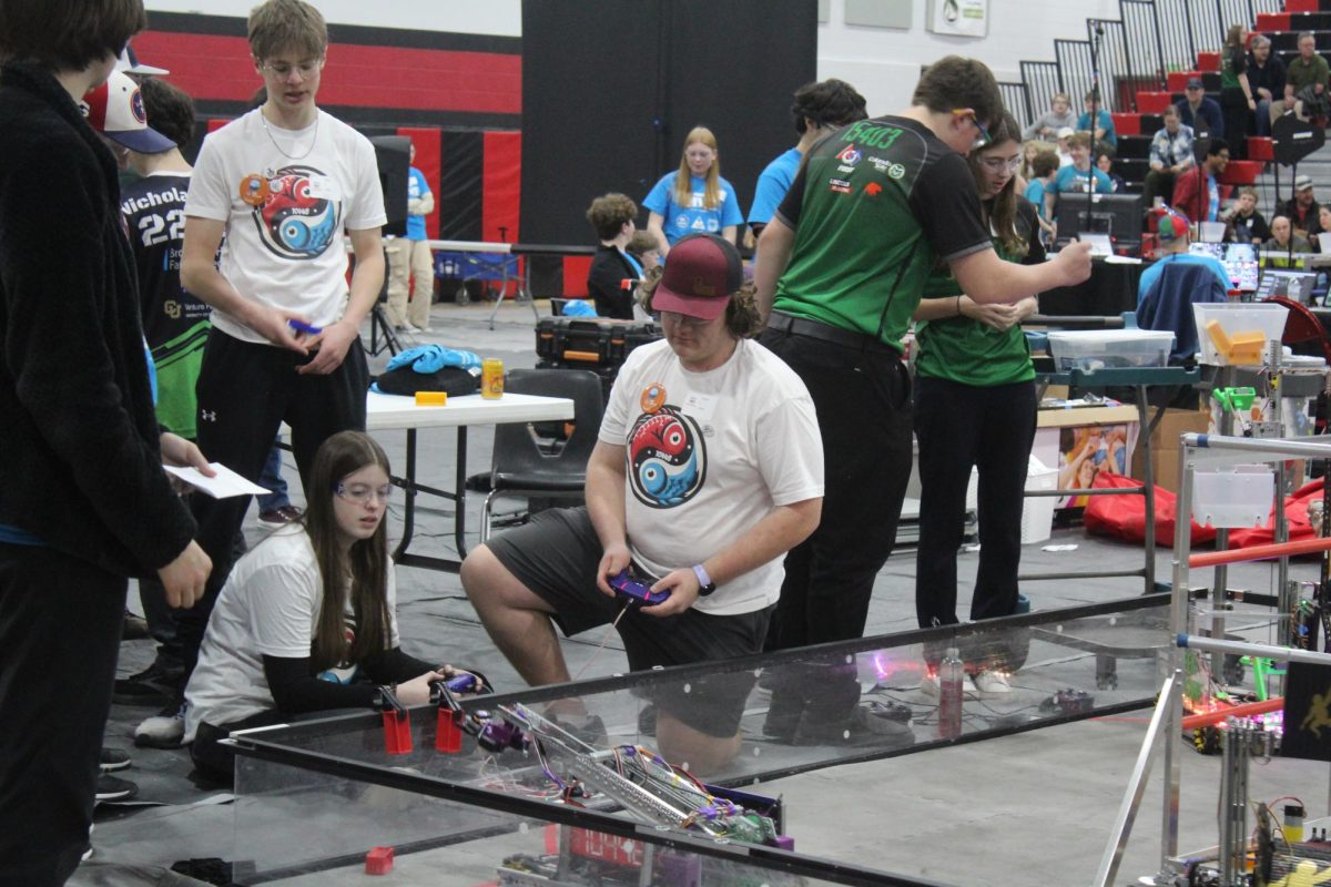 Cooper Dunworth (10) test drives his team's robot. "We tried a lot of different things before we got something to work," Dunworth said. "Then there's also a lot of planning ahead. Like we had to plan to make sure we had spare parts because a lot of times stuff breaks."