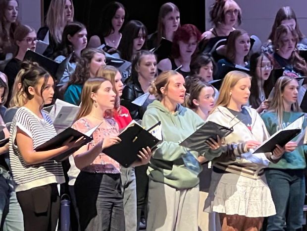 Daisy Darrington (10) sings as part of an ensemble at Combined League on Feb. 5. Darrington has been in high school choir since her freshman year. (Photo provided by Amy Murphy)