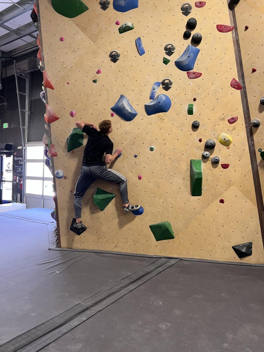 Michael webb climbs a bouldering problem. He had been looking forward to trying something new for weeks prior. 