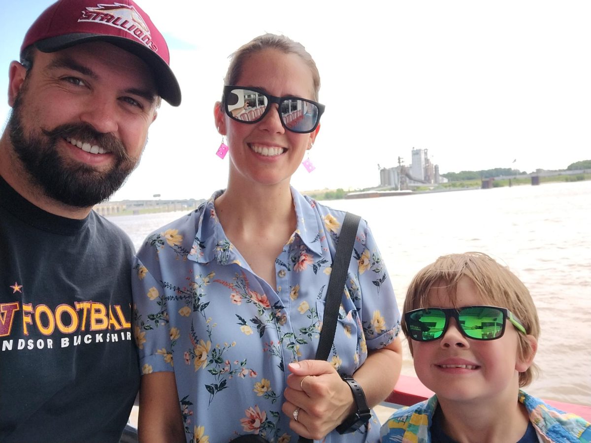 Michael Thompson (staff) takes a pictures with his family. They are supporting him though his time in the America's Favorite Teacher competition. (Photo provided by Michael Thompson)