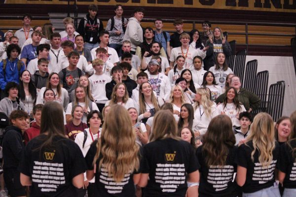 The senior class officers lead the senior class in chants during the Homecoming Week assembly. Many seniors are now solidifying their post-secondary plans. (Photo by Hanna McKay, used with permission)