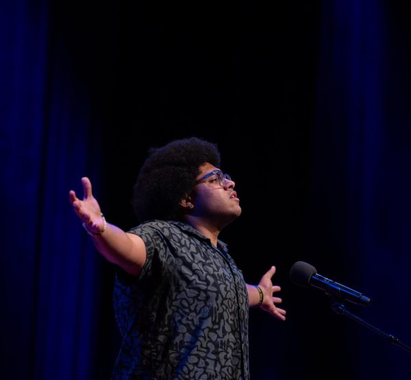 Rize Simmons performs poems at the national Poetry Out Loud competition last year. He won the state competition and will be going back to nationals again this year. (Photo by James Kegley, used with permission)