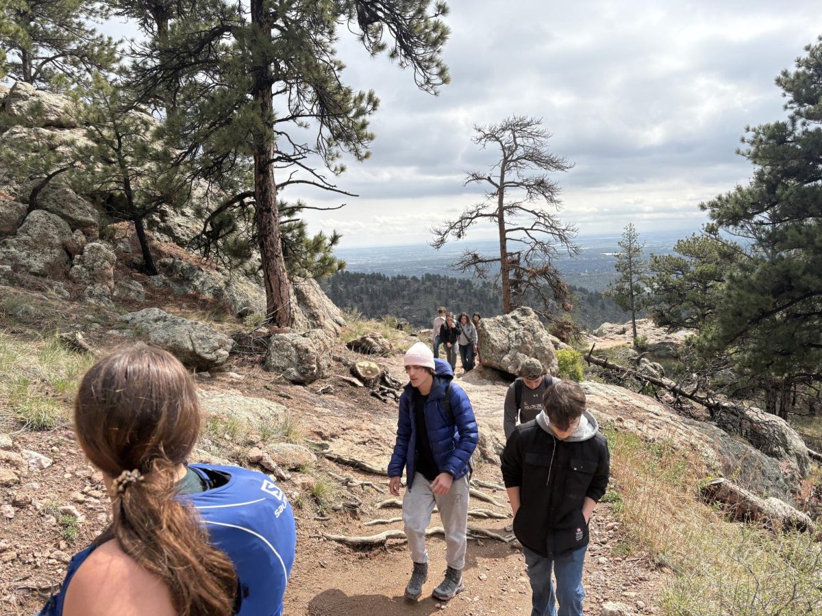 Students hike up the Horsetooth Rock trail with Carley Foxx (staff). The group originally intended on going to Left Hand Canyon in Boulder, but had to switch plans last minute due to weather. 